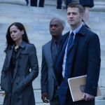 GOTHAM: Detectives James Gordon (Ben McKenzie, R), Renee Montoya (Victoria Cartagena, L) and Crispus Allen (Andrew Stewart Jones, C) meet with a district attorney in the "Harvey Dent" episode of GOTHAM airing Monday, Nov. 17 (8:00-9:00 PM ET/PT) on FOX. ©2014 Fox Broadcasting Co. Cr: Jessica Miglio/FOX