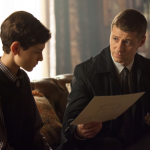 GOTHAM: Detective James Gordon (Ben McKenzie, R) gives Bruce Wayne (David Mazouz, L) new information on his parents' case in the "Harvey Dent" episode of GOTHAM airing Monday, Nov. 17 (8:00-9:00 PM ET/PT) on FOX. ©2014 Fox Broadcasting Co. Cr: Jessica Miglio/FOX