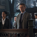 GOTHAM: An unwelcome visitor searches for Detective James Gordon (Ben McKenzie, R) at the GCPD in the "Penguin's Umbrella" episode of GOTHAM airing Monday, Nov. 3 (8:00-9:00 PM ET/PT) on FOX. Also pictured: Zabryna Guevara. ©2014 Fox Broadcasting Co. Cr: Jessica Miglio/FOX