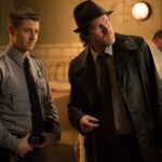 GOTHAM: Detective Harvey Bullock (Donal Logue, R) pays James Gordon (Ben McKenzie, L) a visit at Arkham Asylum in the "Rogues' Gallery" episode of GOTHAM airing Monday, Jan. 5 (8:00-9:00 PM ET/PT) on FOX. ©2014 Fox Broadcasting Co. Cr: Jessica Miglio/FOX