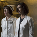 GOTHAM: Dr. Leslie Thompkins (guest star Morena Baccarin, R) and Nurse Dorothy Duncan (guest star Allyce Beasley, L) try to help James Gordon solve a case in the "Rogues' Gallery" episode of GOTHAM airing Monday, Jan. 5 (8:00-9:00 PM ET/PT) on FOX. ©2014 Fox Broadcasting Co. Cr: Jessica Miglio/FOX