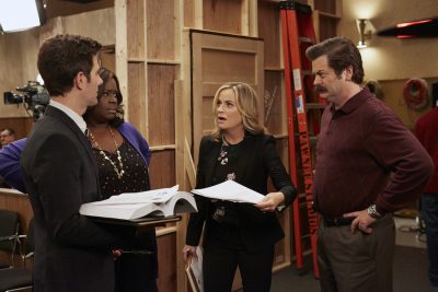 PARKS AND RECREATION -- "GryzzlBox" Episode 706 -- Pictured: (l-r) Adam Scott as Ben Wyatt, Retta as Donna Meagle, Amy Poehler as Leslie Knope, Nick Offerman as Ron Swanson -- (Photo by: Ben Cohen/NBC)