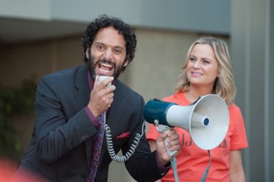 PARKS AND RECREATION -- "Save JJ's" Episode 707 -- Pictured: (l-r) Jason Mantzoukas as Dennis Feinstein, Amy Poehler as Ron Swanson -- (Photo by: Colleen Hayes/NBC)