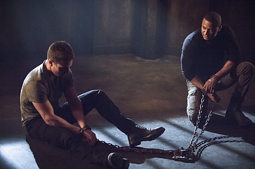 Arrow -- "Nanda Parbat" -- Image AR315B_0212b -- Pictured (L-R): Stephen Amell as Oliver Queen and David Ramsey as John Diggle -- Photo: Cate Cameron/The CW -- �© 2015 The CW Network, LLC. All Rights Reserved.