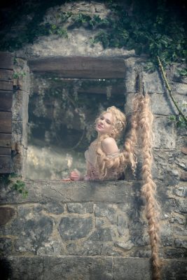 MacKenzie Mauzy stars as Rapunzel in INTO THE WOODS, a modern twist on beloved fairy tales. Based on the Tony?-winning musical and directed by Rob Marshall, the film hits theaters nationwide Dec. 25, 2014. Photo by: Peter Mountain. ? 2014 Disney Enterprises, Inc. All Rights Reserved..