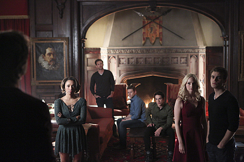 The Vampire Diaries -- "I'm Thinking of You All The While" -- Image Number: VD622b_0009.jpg -- Pictured (L-R): Ian Somerhalder as Damon (back to camera), Kat Graham as Bonnie, Matt Davis as Alaric, Zach Roerig as Matt, Michael Trevino as Tyler, Candice Accola as Caroline and Paul Wesley as Stefan -- Photo: Annette Brown/The CW -- �© 2015 The CW Network, LLC. All rights reserved.