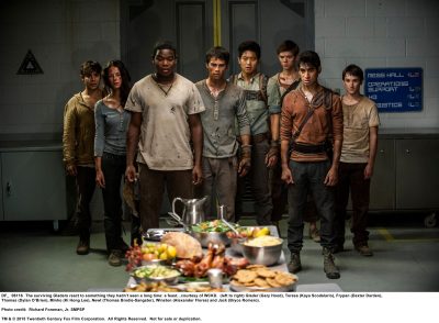 MAZE RUNNER: THE SCORCH TRIALS The surviving Gladers react to something they hadn’t seen a long time: a feast…courtesy of WCKD. (left to right) Glader (Gary Hood), Teresa (Kaya Scodelario), Frypan (Dexter Darden), Thomas (Dylan O’Brien), Minho (Ki Hong Lee), Newt (Thomas Brodie-Sangster), Winston (Alexander Flores) and Jack (Bryce Romero). Photo credit: Richard Foreman, Jr. SMPSP TM and © 2015 Twentieth Century Fox Film Corporation.  All Rights Reserved.  Not for sale or duplication.