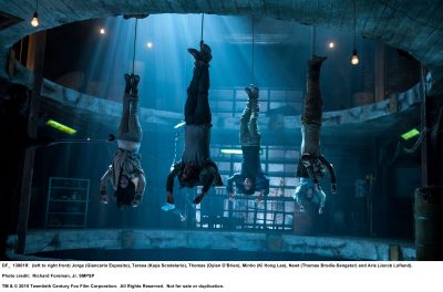 MAZE RUNNER: THE SCORCH TRIALS (left to right front) Jorge (Giancarlo Esposito), Teresa (Kaya Scodelario), Thomas (Dylan O’Brien), Minho (Ki Hong Lee), Newt (Thomas Brodie-Sangster) and Aris (Jacob Lofland). Photo credit: Richard Foreman, Jr. SMPSP TM and © 2015 Twentieth Century Fox Film Corporation.  All Rights Reserved.  Not for sale or duplication.