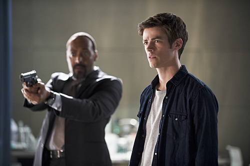 The Flash -- "The Man Who Saved Central City" -- Image FLA201b_0429b.jpg -- Pictured (L-R): Jesse L. Martin as Detective Joe West and Grant Gustin as Barry Allen -- Photo: Cate Cameron /The CW -- Ã?Â© 2015 The CW Network, LLC. All rights reserved.