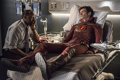 The Flash -- "The Man Who Saved Central City" -- Image FLA201b_0462b.jpg -- Pictured (L-R): Jesse L. Martin as Detective Joe West and Grant Gustin as Barry Allen -- Photo: Cate Cameron /The CW -- Ã?Â© 2015 The CW Network, LLC. All rights reserved.