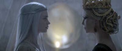 The Huntsman Winter's War Image Still; Featuring Charlize Theron is The Evil Queen and Emily Blunt as Freya The Ice Queen. Photo Credit: Universal Pictures